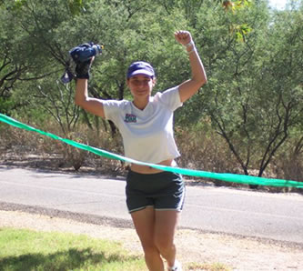 Jennie triumphantly crossing the finish line.