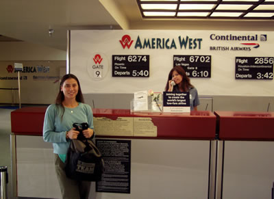 Jennie at American West counter at Tucson Airport