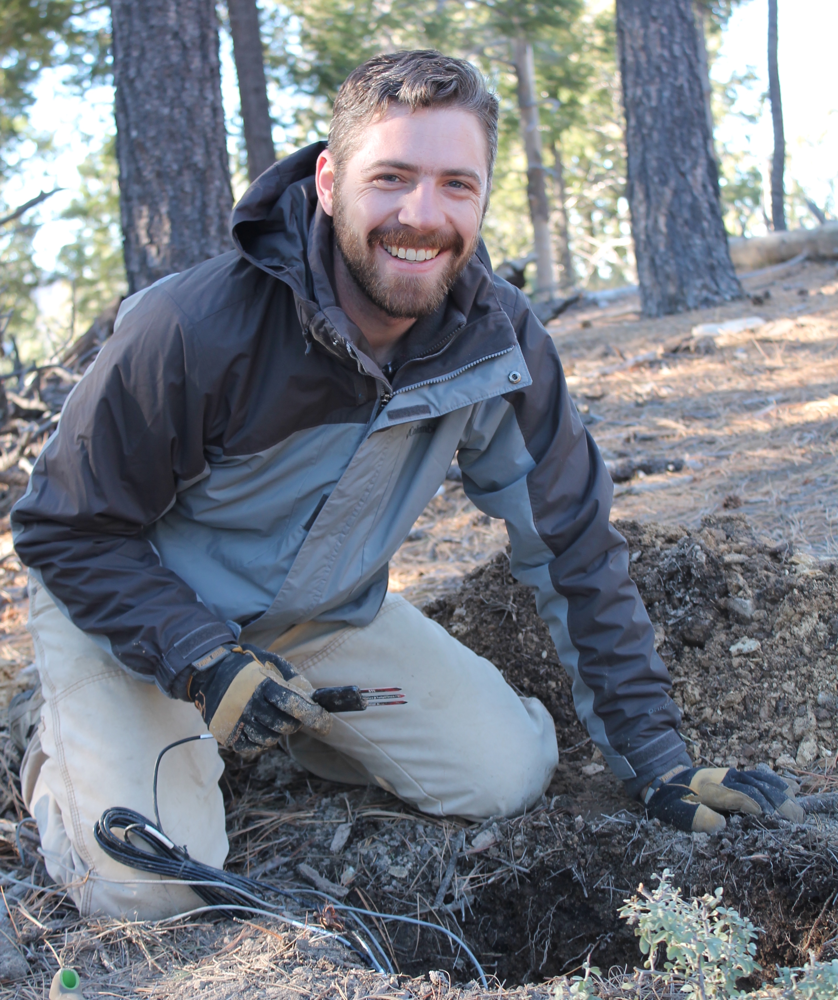 Patrick installing soil moisture probes at the Mt. Bigelow field site